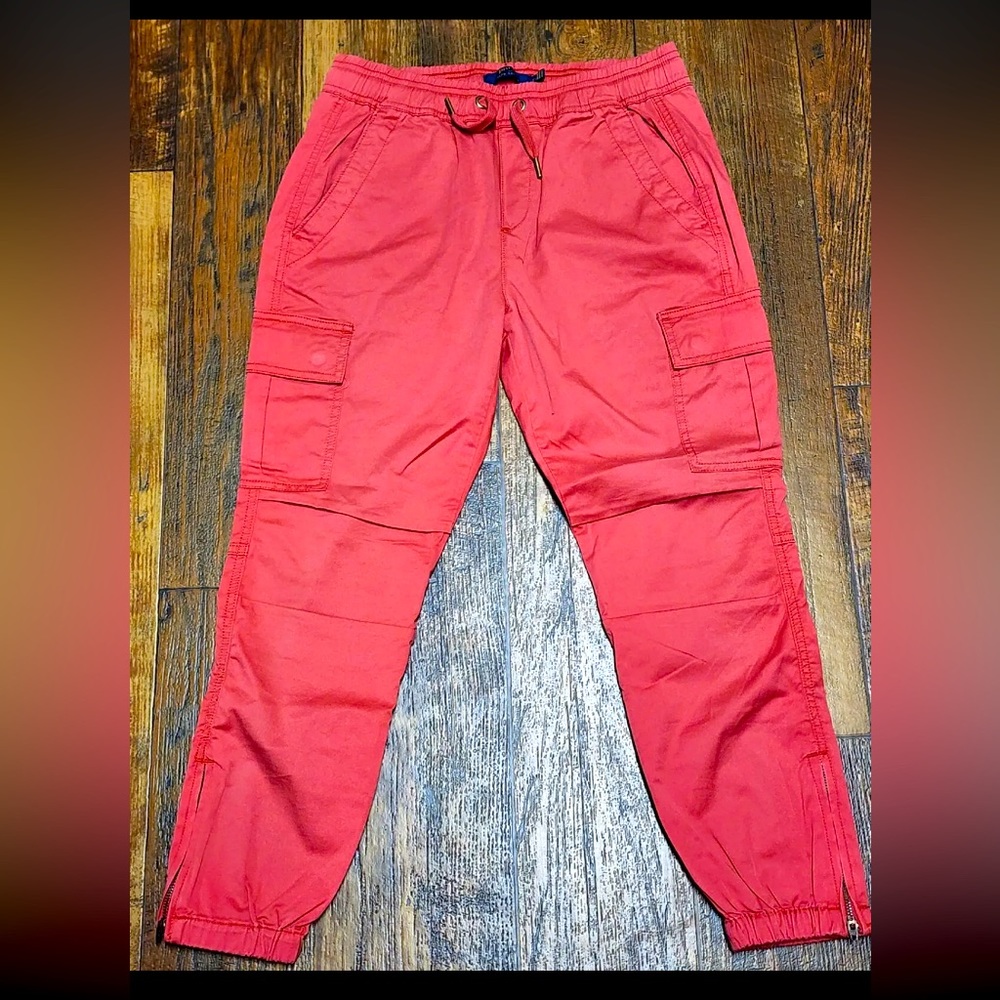 New without the tags on Ralph Lauren Coral Cargo Pants with zipper ankle.